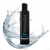 Black bottle of Popstar Play water-based lubricant with water splashes on a white background